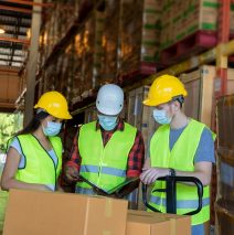 Warehouse Workers With Schedule